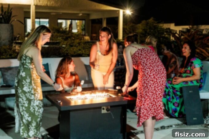 Elevate Your Outdoor Entertaining 5 Pro Tips 18 People enjoying s'mores around a fire pit