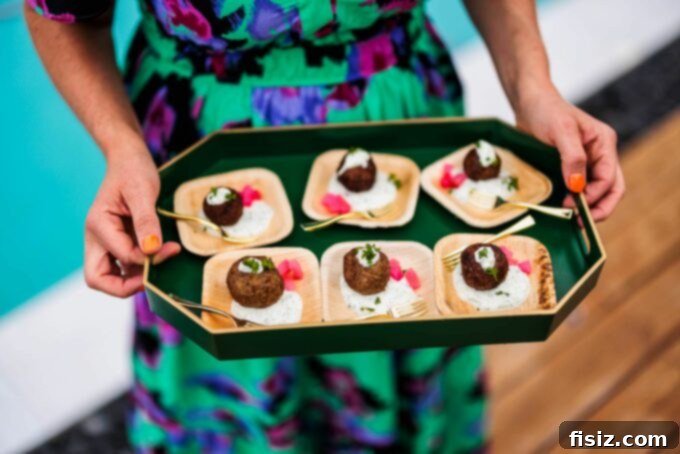 Elevate Your Outdoor Entertaining 5 Pro Tips 7 Lebanese kibbeh on a serving tray with fresh herbs