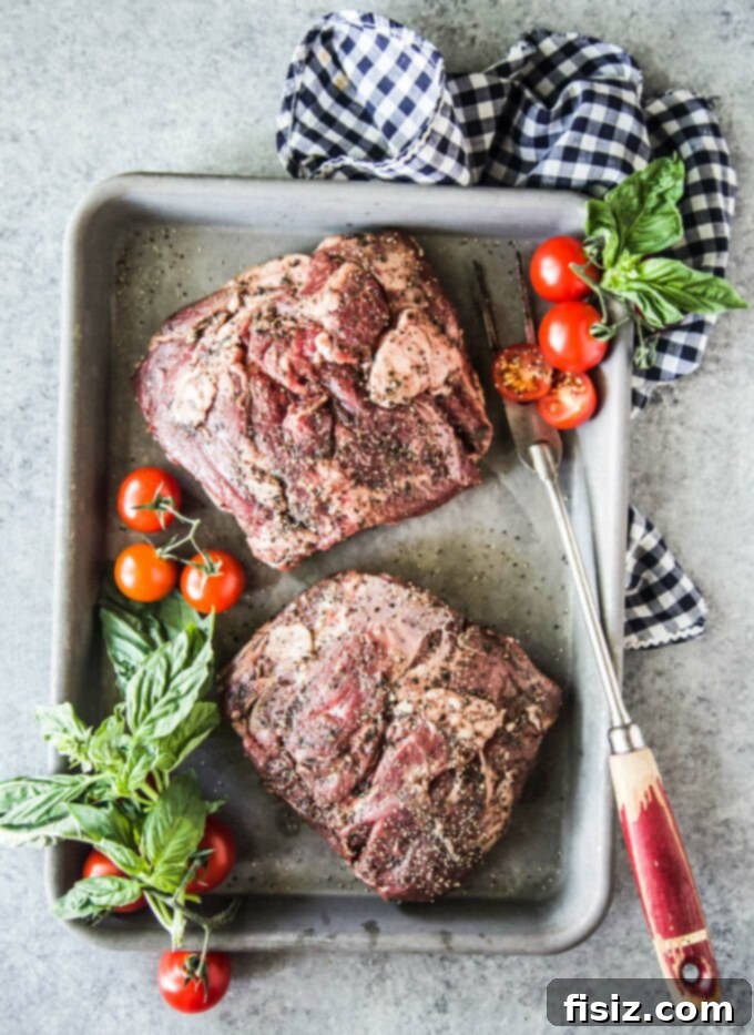 American Lamb Sirloin Caprese Sliders 4 Seasoned American Lamb Sirloin Chops on a baking sheet, ready for grilling