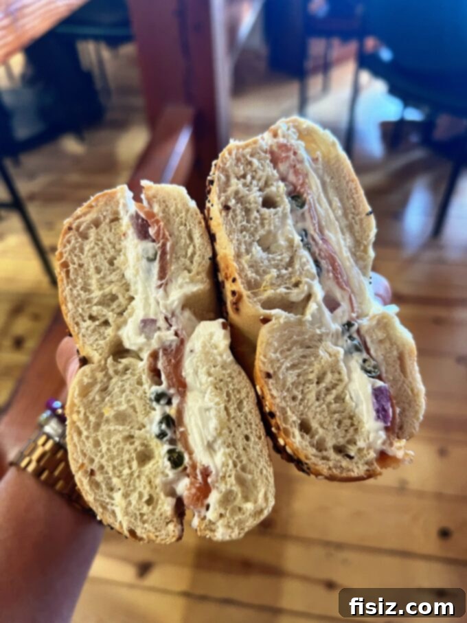 Rapid City South Dakota Stay Eat Explore 11 A delicious bagel sandwich with fresh ingredients from Black Hills Bagels, ideal for a morning meal.