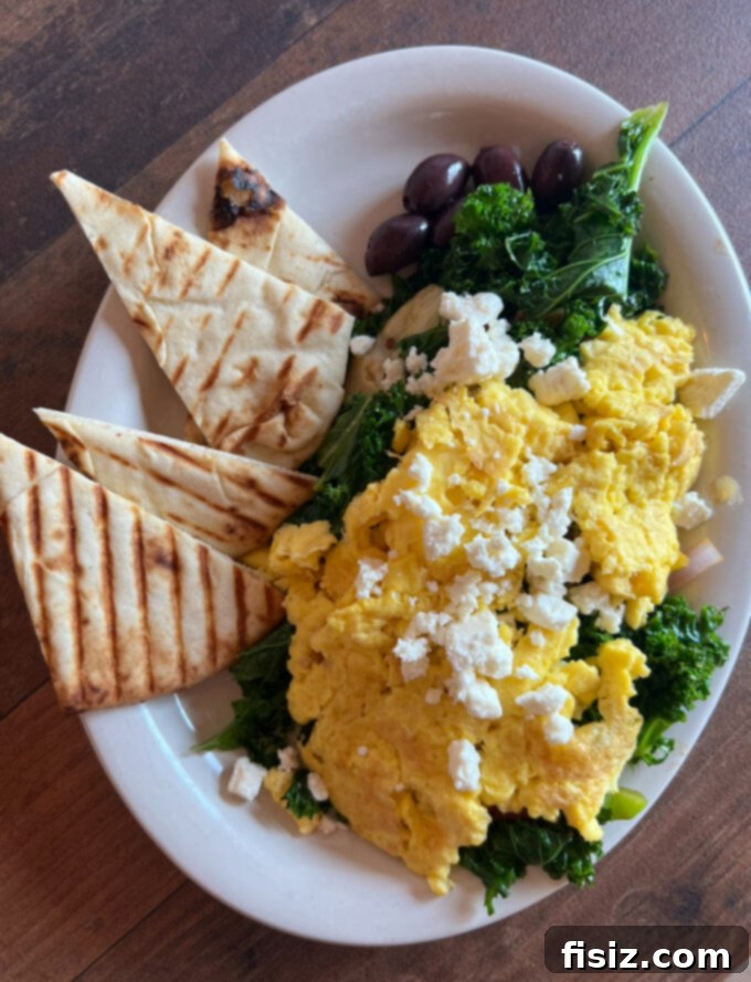 Rapid City South Dakota Stay Eat Explore 13 A hearty Mediterranean scramble from Essence of Coffee, showcasing fresh ingredients and vibrant flavors.