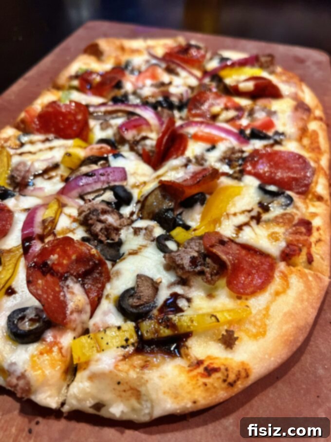 Rapid City South Dakota Stay Eat Explore 26 A delicious, freshly baked pizza from Independent Ale House, perfect for sharing.