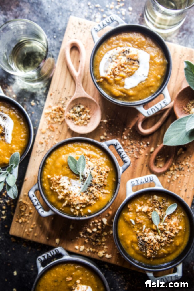 Spicy Roasted Butternut Squash Soup 2 Vibrant Jerk Butternut Squash Soup in a bowl, garnished with cream