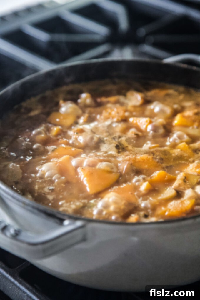 Spicy Roasted Butternut Squash Soup 7 Jerk Butternut Squash Soup simmering in a stockpot