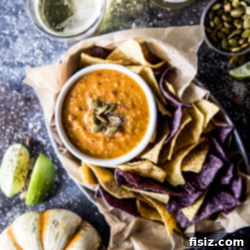 Tangy Heat Pumpkin Tomatillo Salsa 9 A detailed close-up of the Spiced Pumpkin Tomatillo Salsa in a bowl, showcasing its rich texture and color.
