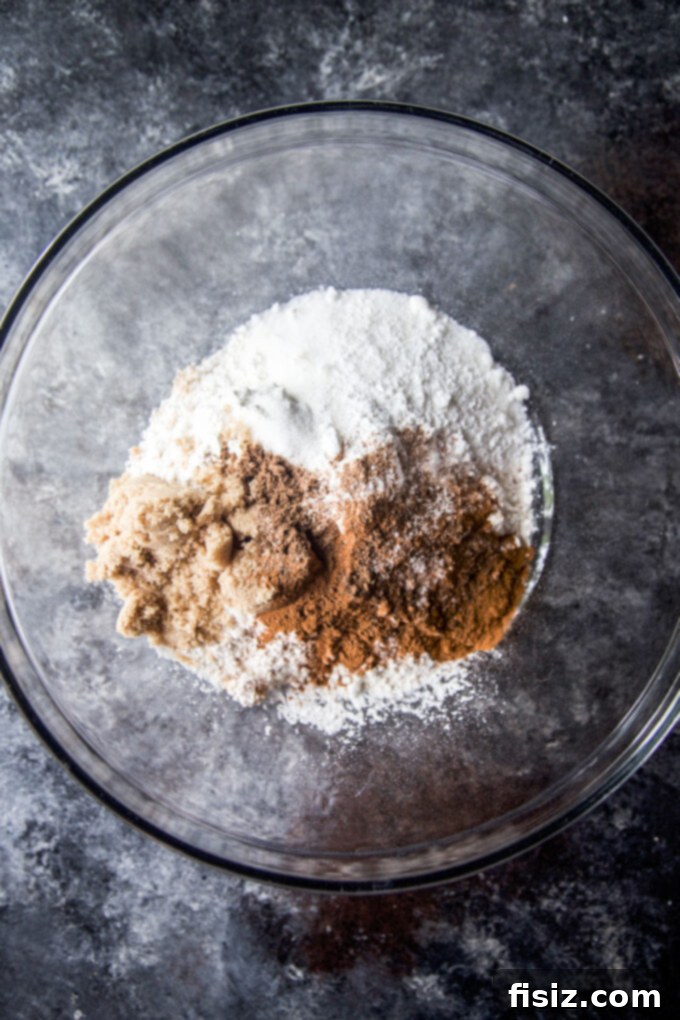 Heavenly Baked Coconut Cardamom Pecan Doughnuts 4 Doughnut batter being mixed in a large bowl