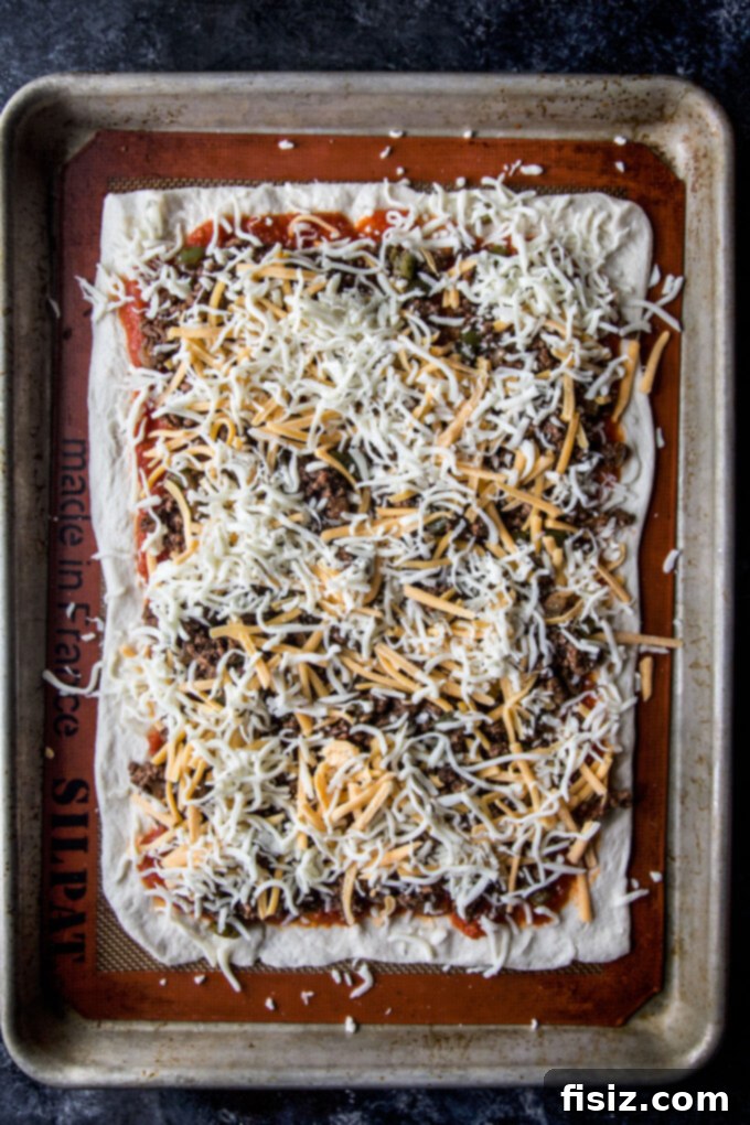 Loaded Chili Cheese Pizza 7 Freshly baked Easy Chili Cheese Pizza sliced and ready to serve