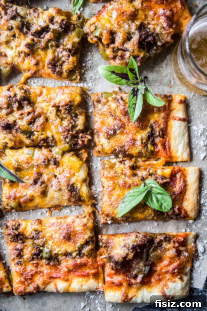 Loaded Chili Cheese Pizza 9 Chili Cheese Pizza with a close-up on the melted cheese and hearty chili topping