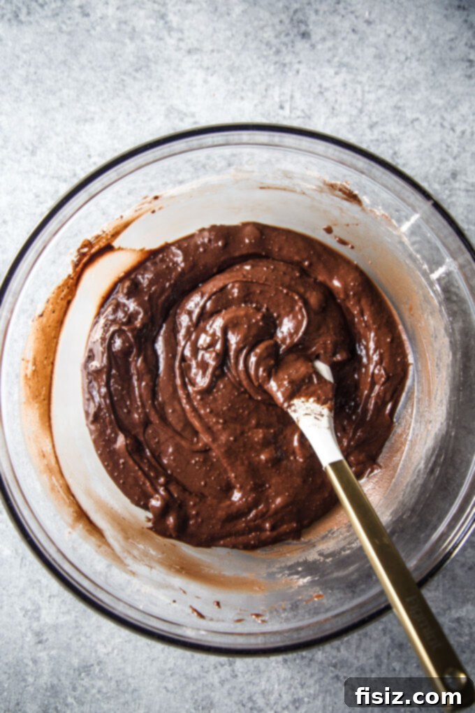 Chocolate Mint Croissant Bliss 4 Freshly prepared brownie batter in a mixing bowl.