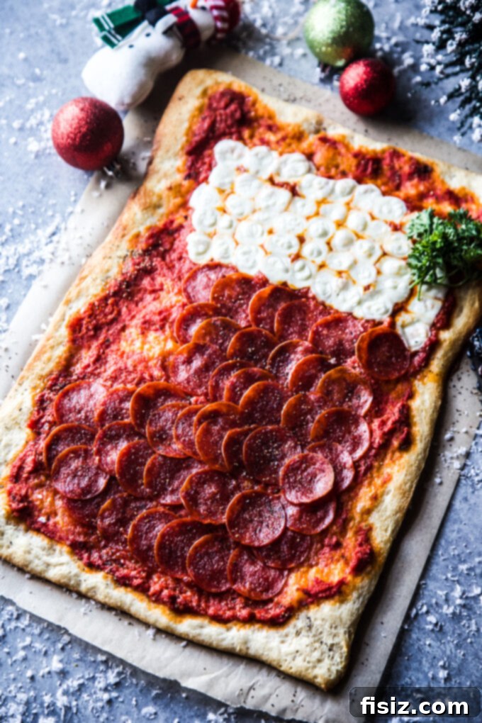 Stocking shaped pepperoni pizza on a festive serving platter