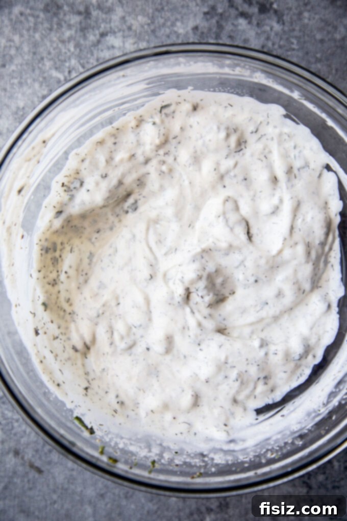 Zesty Indian Chicken Tenders with a Cooling Ranch Dip 7 A bowl of creamy, freshly made Cool Ranch Dipping Sauce.
