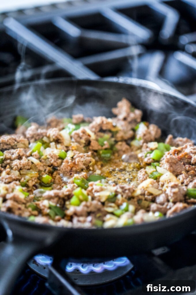 Classic American Lamb Stromboli 6 ground lamb in a skillet