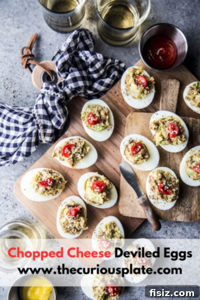 Deli-Style Chopped Cheese Deviled Eggs 11 Beautifully arranged platter of Chopped Cheese Deviled Eggs with a focus on their delicious filling