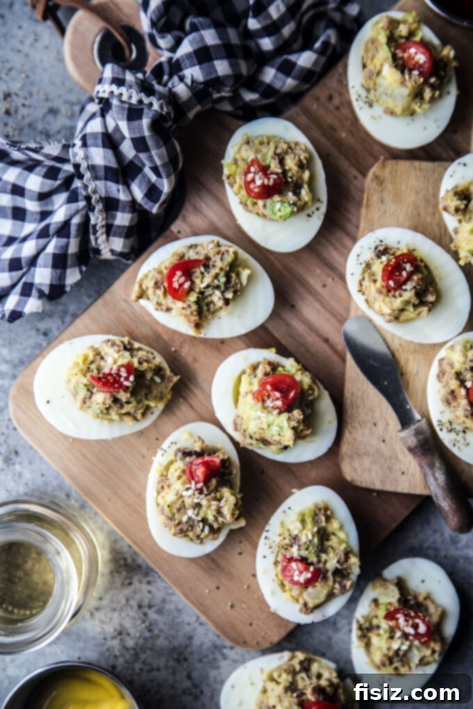 Deli-Style Chopped Cheese Deviled Eggs 3 Chopped Cheese Deviled Eggs with a rich, savory filling and fresh garnishes