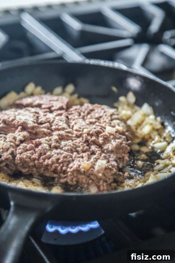 Deli-Style Chopped Cheese Deviled Eggs 4 Sizzling ground beef in a skillet, seasoned and ready for the chopped cheese mixture