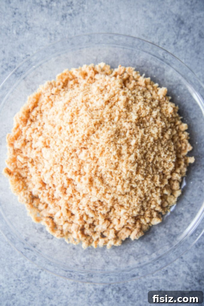 Finely crushed chicharrones in a bowl, ready for coating
