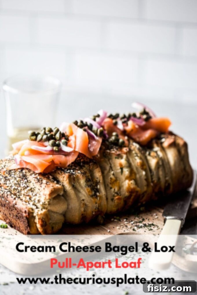 Bagel and Lox Pull-Apart Loaf with Cream Cheese 11 Beautifully presented Cream Cheese Bagel & Lox Pull-Apart Loaf, a perfect brunch centerpiece