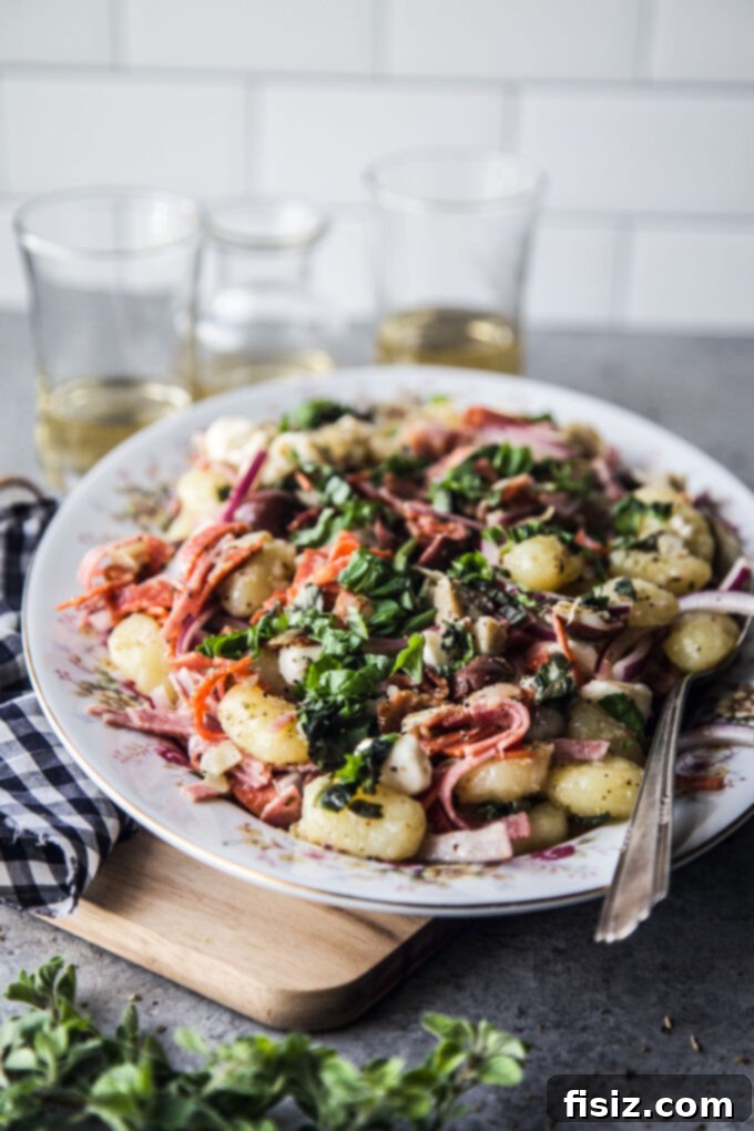 Mediterranean Gnocchi Antipasto 3 Close-up of Easy Antipasto Gnocchi Salad featuring pillowy gnocchi, savory salami, fresh mozzarella, and briny olives