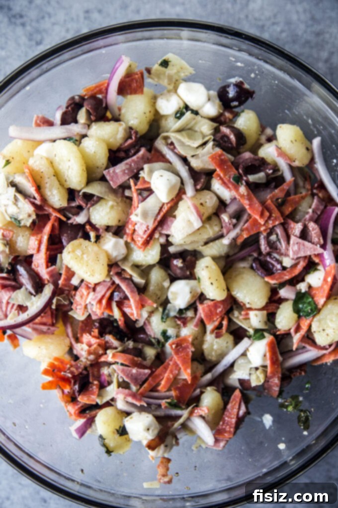 Mediterranean Gnocchi Antipasto 6 Easy Antipasto Gnocchi Salad served in a large elegant bowl, showcasing its colorful ingredients