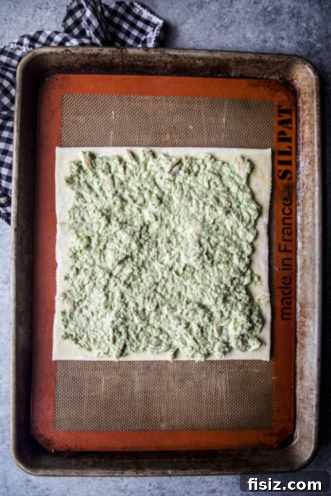 Flaky Green Goddess Tuna Tart 6 pre-tart on a baking sheet