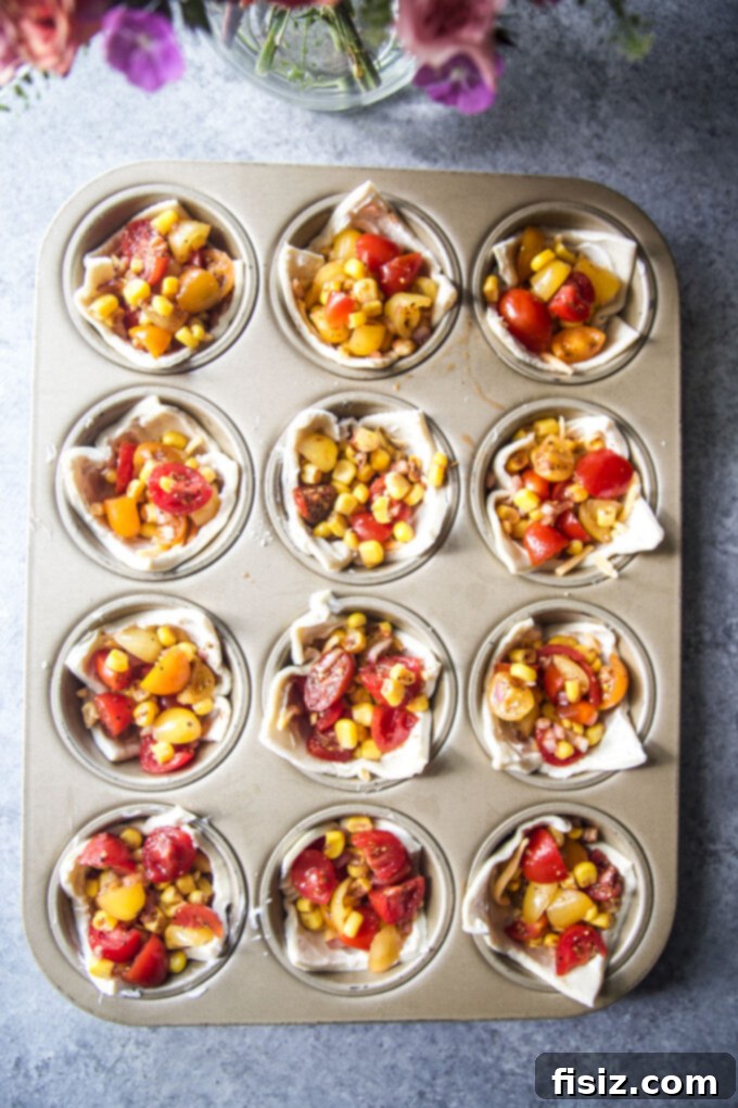 Savory Tomato Tarts 8 Tomato, corn, and spice mixture spooned into cheese-filled puff pastry cups.