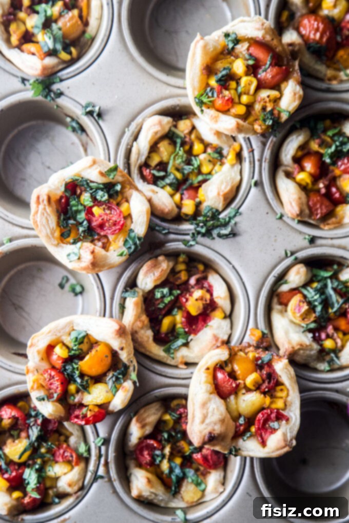 Savory Tomato Tarts 10 Final presentation of Muffin Pan Tajin Tomato Tarts on a rustic serving board.