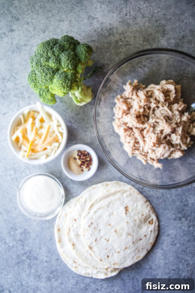 Ranch Chicken and Broccoli Smashed Tacos 4 Chicken & Broccoli Ranch Smashed Tacos cooking in a skillet
