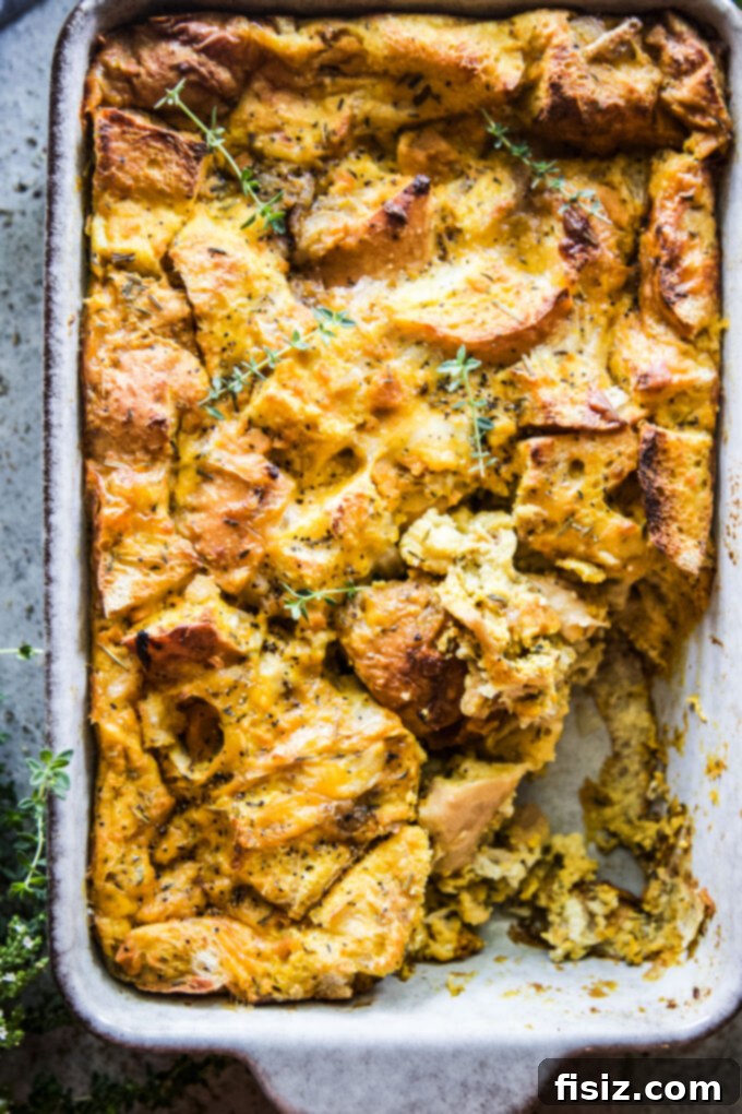 Golden Pumpkin and Smoky Cheddar Strata 3 Close-up of baked Pumpkin and Smoked Cheddar Strata showing crispy edges
