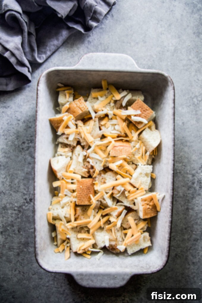 Golden Pumpkin and Smoky Cheddar Strata 5 Bread cubes layered with grated smoked cheddar cheese