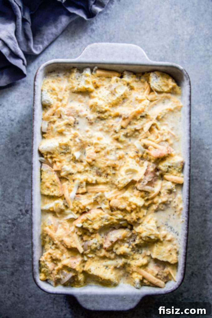 Golden Pumpkin and Smoky Cheddar Strata 6 Unbaked pumpkin and smoked cheddar strata, ready for chilling