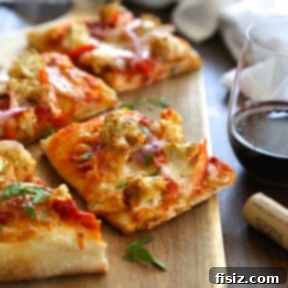 Harissa Pizza with Moroccan Spiced Cauliflower and Roasted Red Peppers 2 Harissa Pizza with Moroccan Spiced Cauliflower & Red Peppers