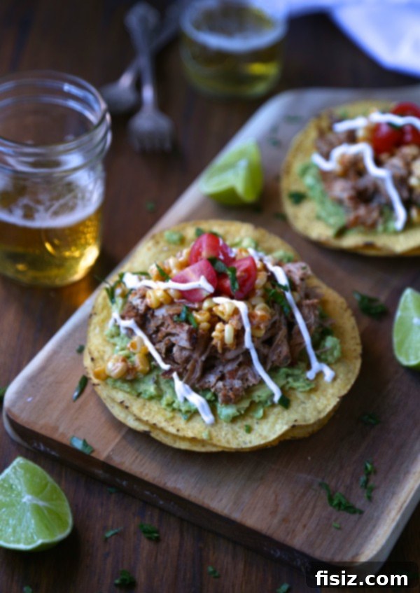 Fall-Off-The-Bone Slow Cooker Ribs with Zesty Corn Relish 2 Crispy baby back rib tostadas garnished with fresh corn relish and a generous dollop of crema.