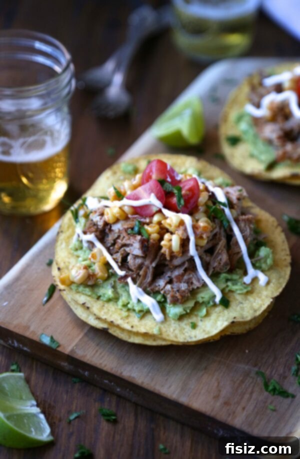 Fall-Off-The-Bone Slow Cooker Ribs with Zesty Corn Relish 5 Fully assembled tostadas, layered with mashed avocado, shredded ribs, corn relish, grape tomatoes, and Mexican crema.