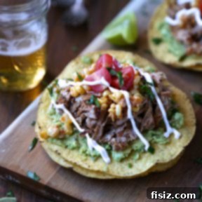 Slow Cooker Spiced Baby Back Rib Tostadas with Corn Relish & Crema