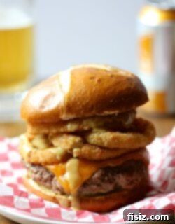 Foodie Fridays: Ballpark Homerun Burger with Beer Mustard and Crispy Onion Rings 2 A perfectly cooked Juicy Ball Park Burger with melted cheese, onion rings, and mustard beer sauce