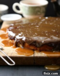 Decadent Banana Cake with Dark Chocolate Frosting & Salted Caramel 2 The perfect slice of banana cake with dark chocolate frosting and salted caramel.