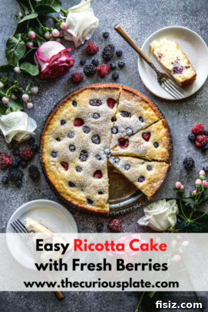Effortless Berry Ricotta Delight 12 Full shot of Ricotta Cake with Fresh Berries on a white stand