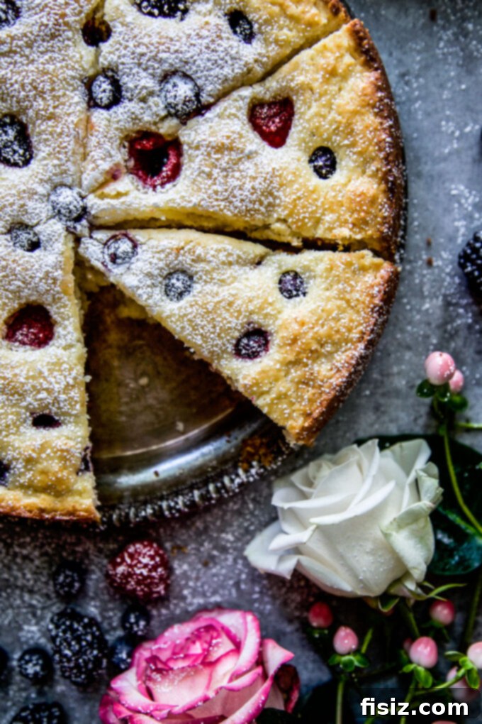 Effortless Berry Ricotta Delight 3 Close-up of a slice of Ricotta Cake with Fresh Berries, showing its fluffy texture