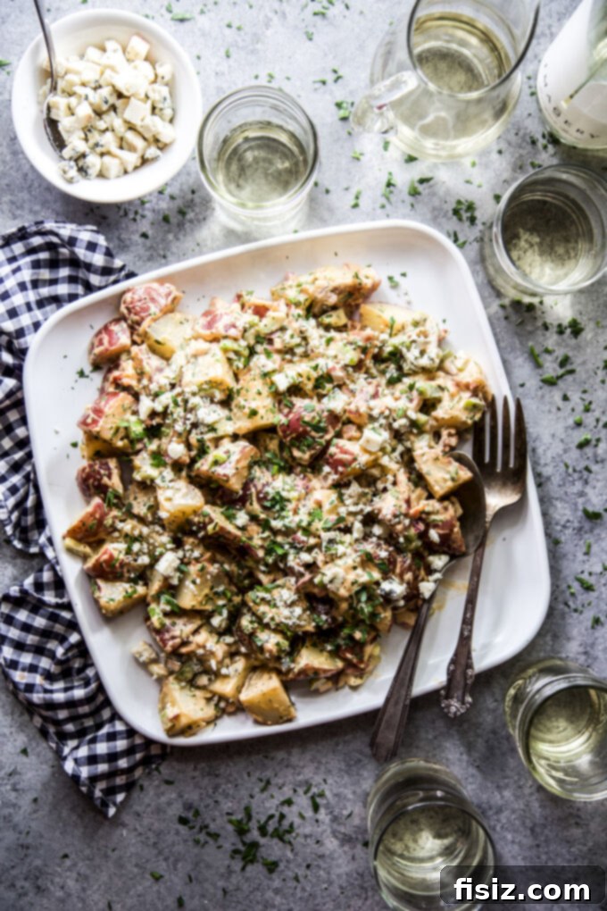 Loaded BBQ Bacon Blue Potato Salad 2 Barbecue, Bacon, and Blue Cheese Potato Salad with creamy dressing