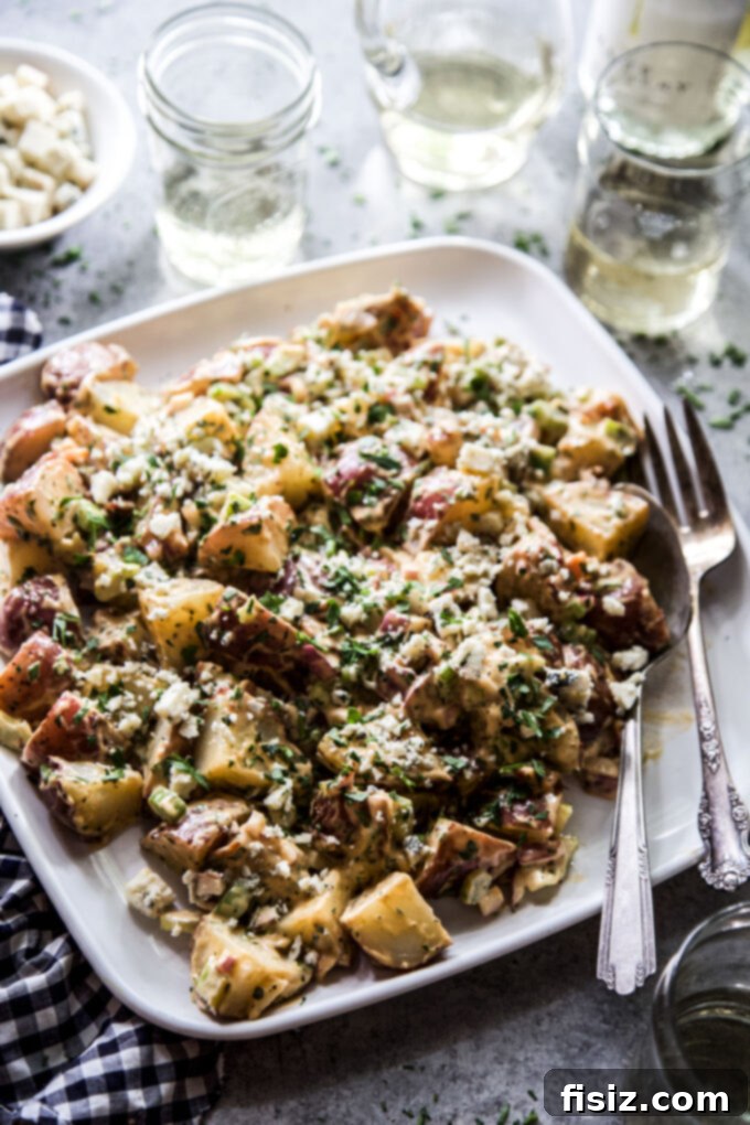 Loaded BBQ Bacon Blue Potato Salad 8 Assembled Barbecue, Bacon, and Blue Cheese Potato Salad in a serving bowl