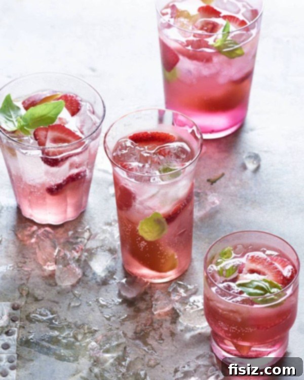 Elegant Strawberry and Peach Rosé Sangria in a pitcher