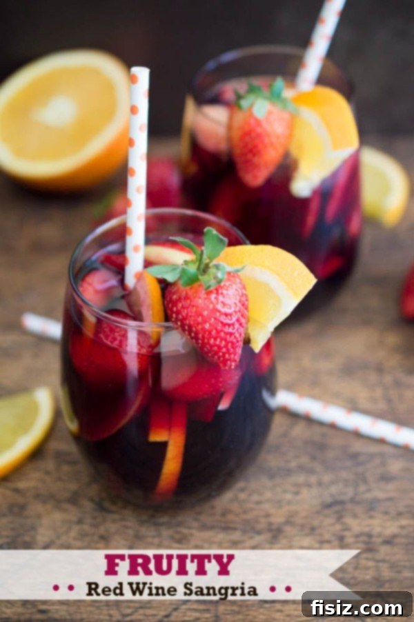 Traditional Red Wine Sangria in a glass, garnished with citrus