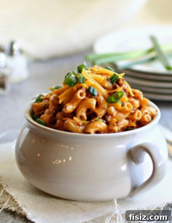 10 Ultimate Tailgate Chili Recipes 11 Chili Mac, a comforting blend of chili and macaroni, served hot.