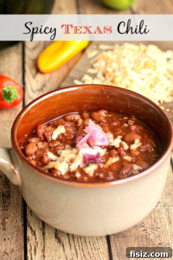 10 Ultimate Tailgate Chili Recipes 8 A large pot of Spicy Texas Chili, steaming hot and ready for tailgating.