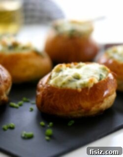 Warm Mini Brussel Sprout and Spinach Dip Bread Bowls 2 A small bowl of the creamy Mini Brussel Sprout & Spinach Dip