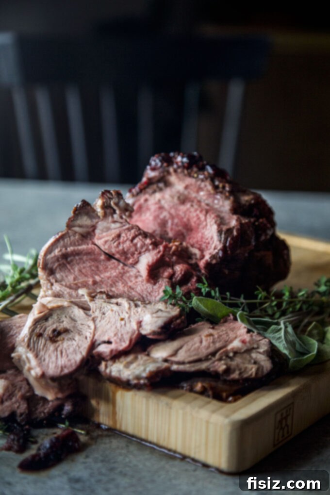 Oven-Roasted Boneless American Lamb Leg with Cranberry-Mustard Glaze
Lamb Roast with Cranberry-Mustard: An American Classic 3 Close-up of Oven Roasted Boneless Leg of American Lamb with Cranberry-Mustard Glaze