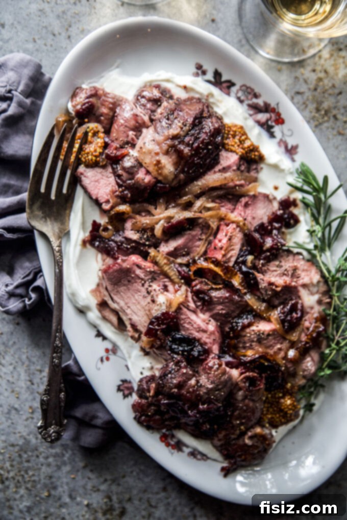 Oven-Roasted Boneless American Lamb Leg with Cranberry-Mustard Glaze
Lamb Roast with Cranberry-Mustard: An American Classic 8 Perfectly Sliced Oven Roasted Boneless Leg of American Lamb with Cranberry-Mustard Glaze
