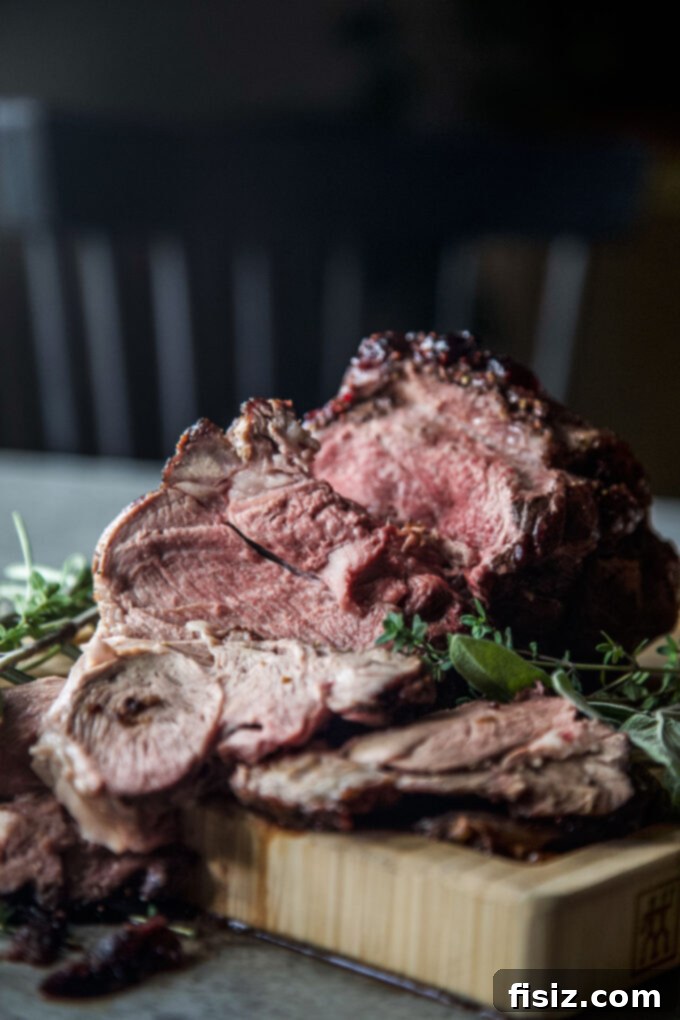 Oven-Roasted Boneless American Lamb Leg with Cranberry-Mustard Glaze
Lamb Roast with Cranberry-Mustard: An American Classic 9 Close-up of Sliced Oven Roasted Boneless Leg of American Lamb with Cranberry-Mustard Glaze