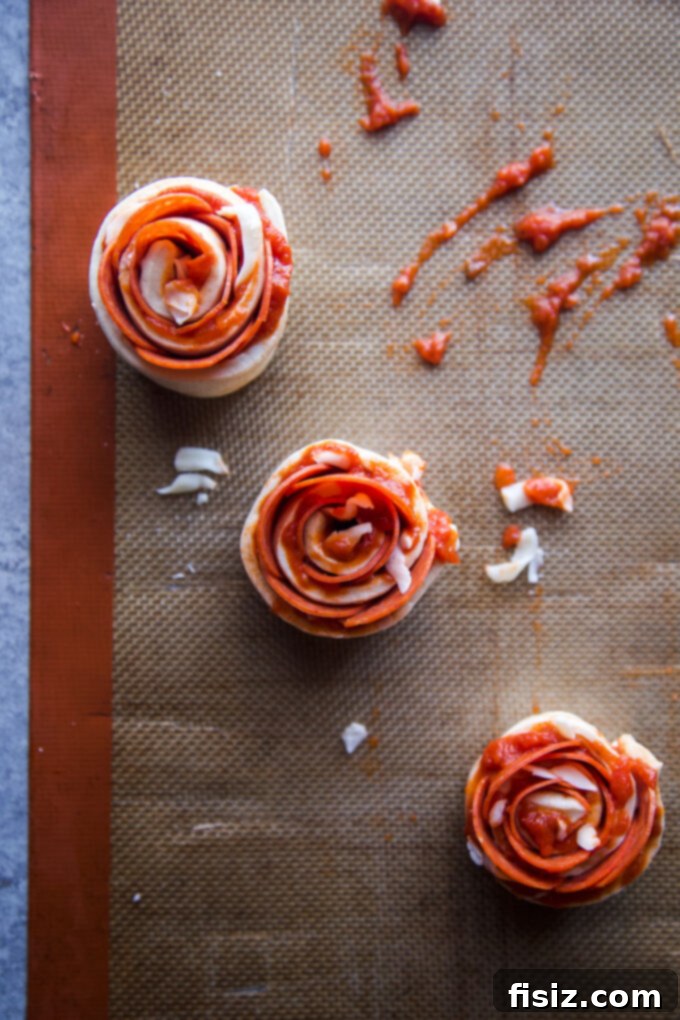 Pizza dough rolled up into roses