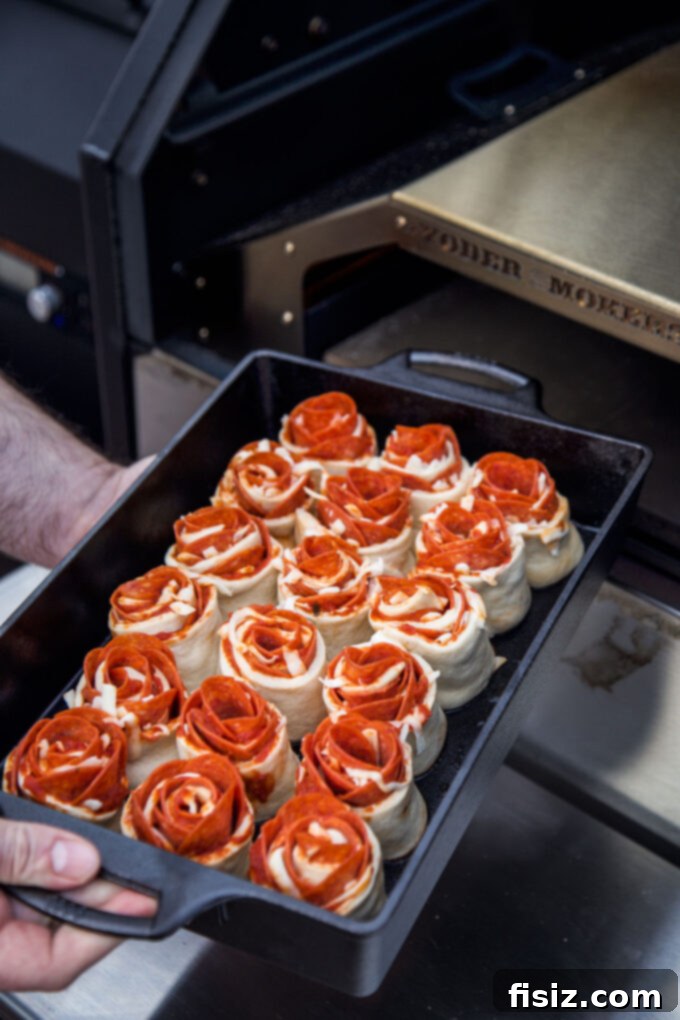 Pizza roses going into the pizza oven
